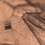 Robot sitting on a penny