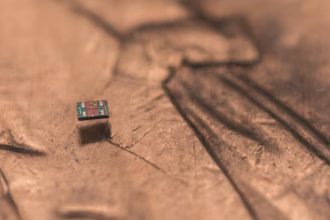 Robot sitting on a penny