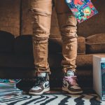 Comic books in a box on the floor