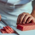 Tuna being sliced