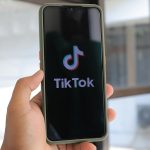 TikTok logo on a phone