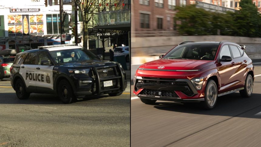 Police car alongside red SUV on road