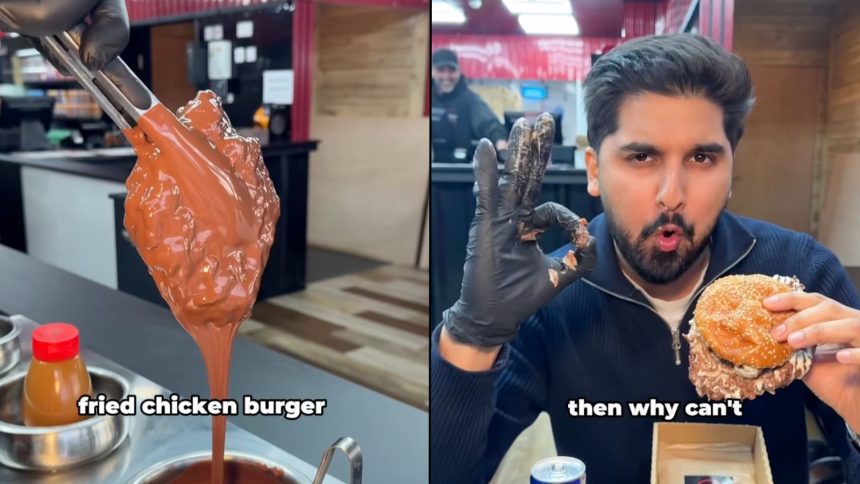 Man holding hand up with burger inside