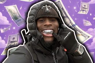 A photo of Kai Cenat showing off his grills.