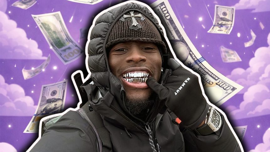 A photo of Kai Cenat showing off his grills.