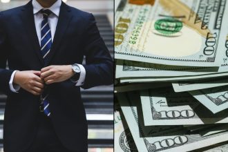 Lawyer fastening suit and walking down stairs alongside stack of money
