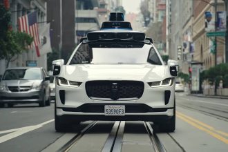 Screenshot of a Waymo car from the official Waymo YouTube channel video, ' 0:02 / 3:40 Sense, Solve, and Go: The Magic of the Waymo Driver.'